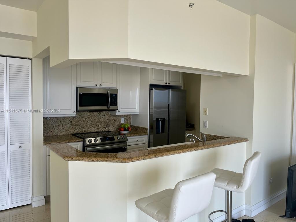 THREE TEQUESTA POINT COND - Residential Lease