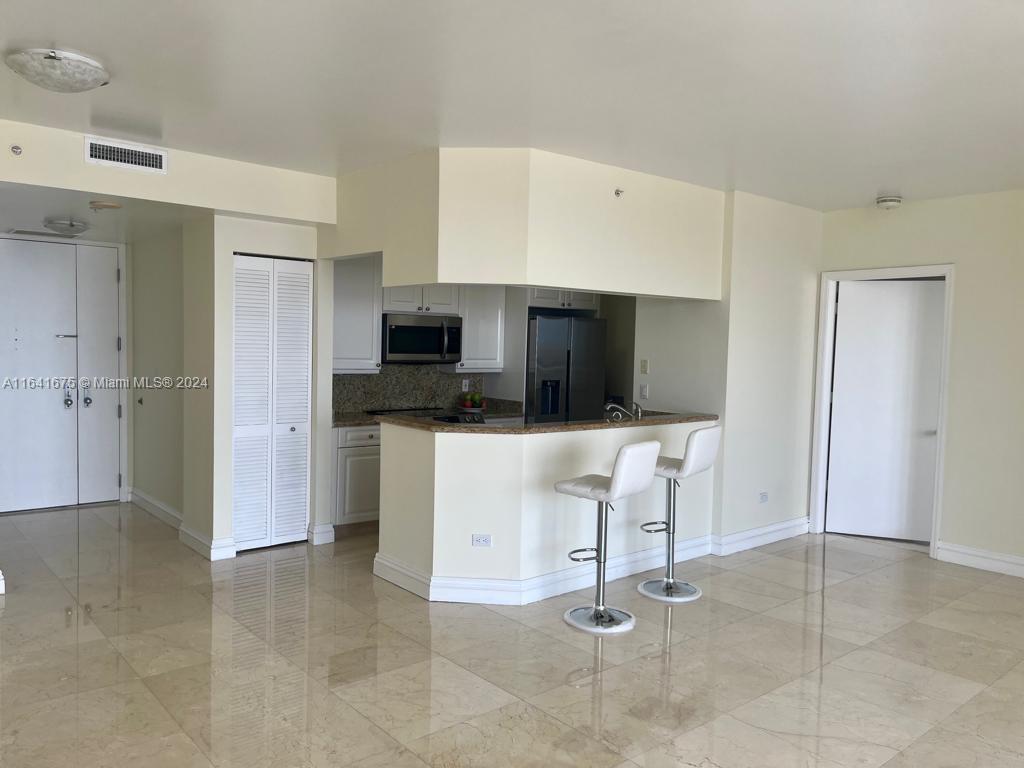 THREE TEQUESTA POINT COND - Residential Lease