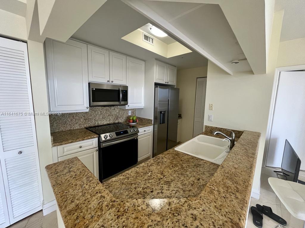 THREE TEQUESTA POINT COND - Residential Lease