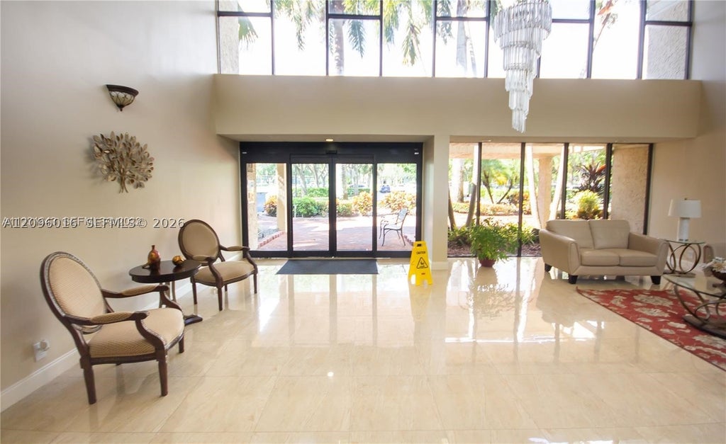 Photo of 16251 Golf Club Rd #109, Weston, FL 33326 (MLS # A12096016)