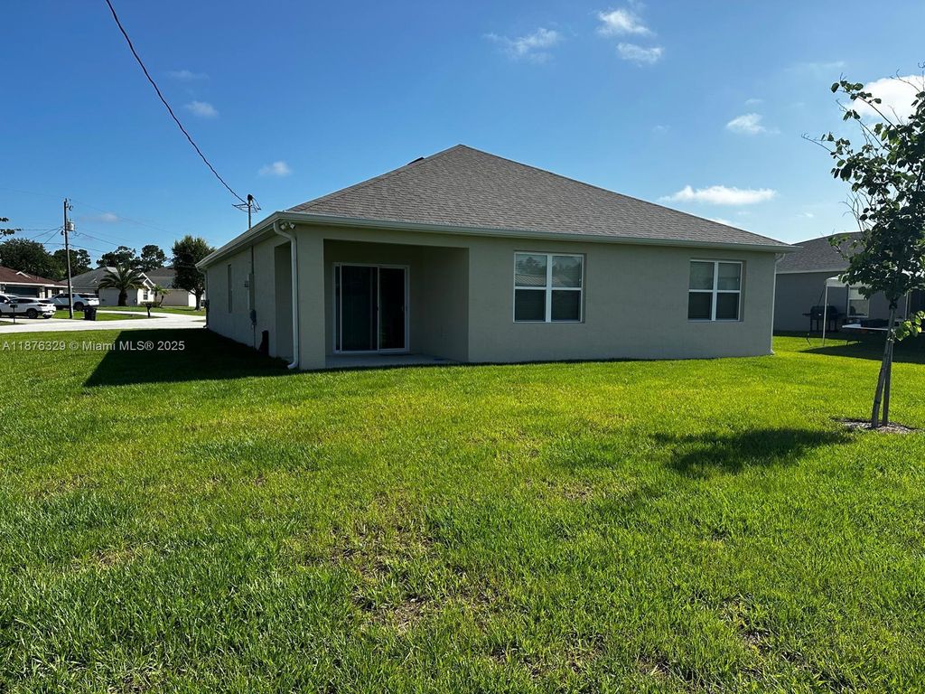 Photo of 2098 SW Altman Ave, Port St Lucie, FL 34953 (MLS # A11876329)