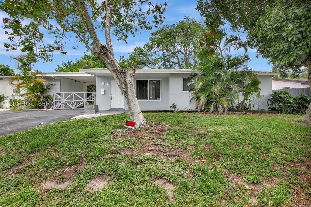 Photo of 311 SW 68th Ter, Pembroke Pines, FL 33023 (MLS # A12066931)