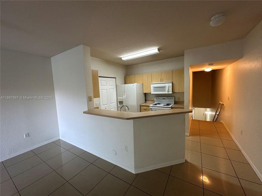Stunning 2/2 two-story townhouse with tile floors throughout in an ideal location, washer & dryer, amazing view. Don't miss it! This community also features a clubhouse, pool and OVERSIZE ONE CAR GARAGE proof of income and background check required 1st Month, Last month and Security Deposit. PET FEE $250.00 (Non-Refundable), NONE aggressive dogs only. Credit Background and Eviction reports will be used as supplemental data to evaluate application
