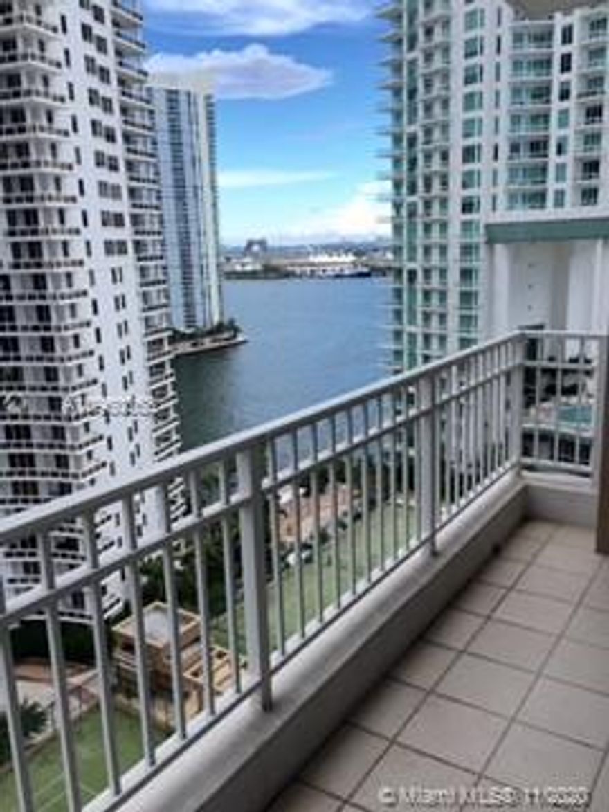 Beautiful 1 bedroom, 1.5 bathroom executive apartment with large bedroom and ample closets. New crema marfil marble floors throughout, ceiling light fixtures, window shades in the bedroom and washer/dryer in the unit. Enjoy NE water views of the intracoastal and the city from all the living spaces and the spacious terrace.  Amenities include 1 assigned parking space, valet and concierge services 24/7, and management on site. Easy access to restaurants, shops and markets on Brickell Key, Mary Brickell Village and Brickell City Center.