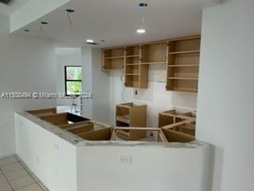 Photo of 1608 Newport Ln, Weston, FL 33326 (MLS # A11508494)