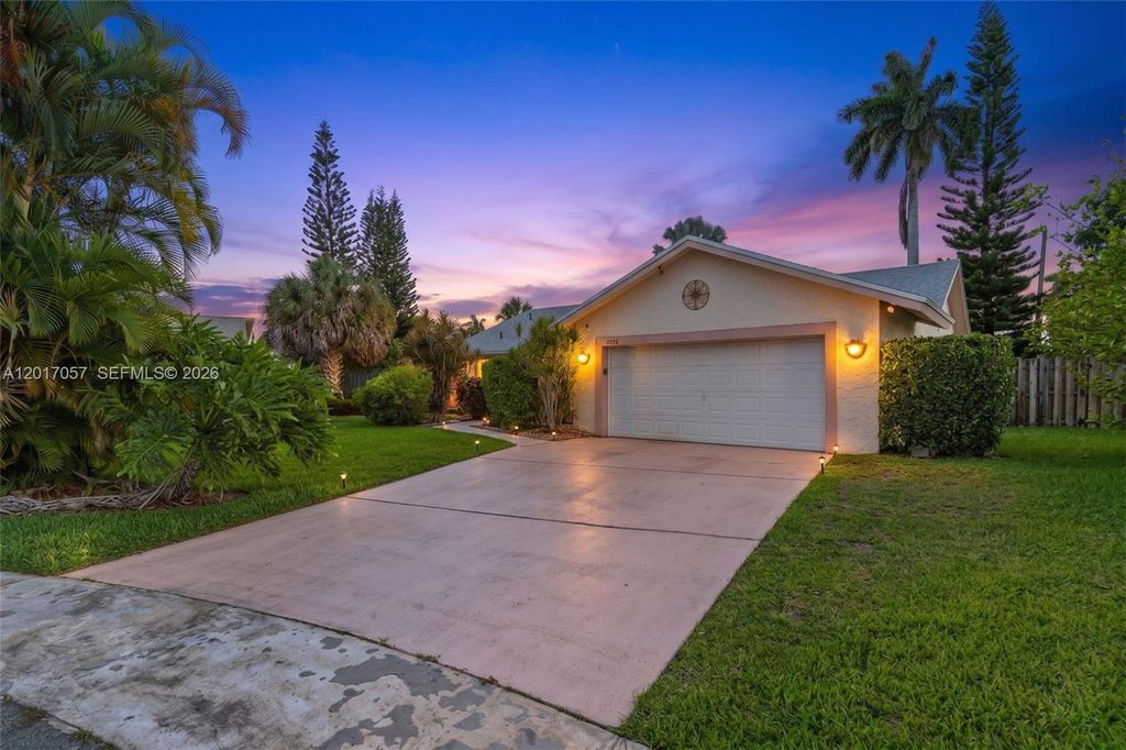 Photo of 9470 NW 33rd Mnr, Sunrise, FL 33351 (MLS # A12017057)