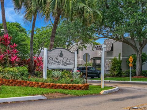 Photo of 1505 NW 113th Ave, Pembroke Pines, FL 33026 (MLS # A12000966)