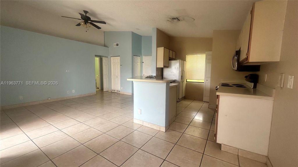 Photo of 9999 Summerbreeze Dr #315, Sunrise, FL 33322 (MLS # A11963771)