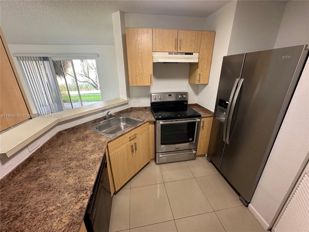 Photo of 3413 NW 44th St #106, Oakland Park, FL 33309 (MLS # A11899792)