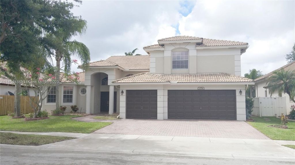 Photo of 13756 NW 21st St, Pembroke Pines, FL 33028 (MLS # A11404486)