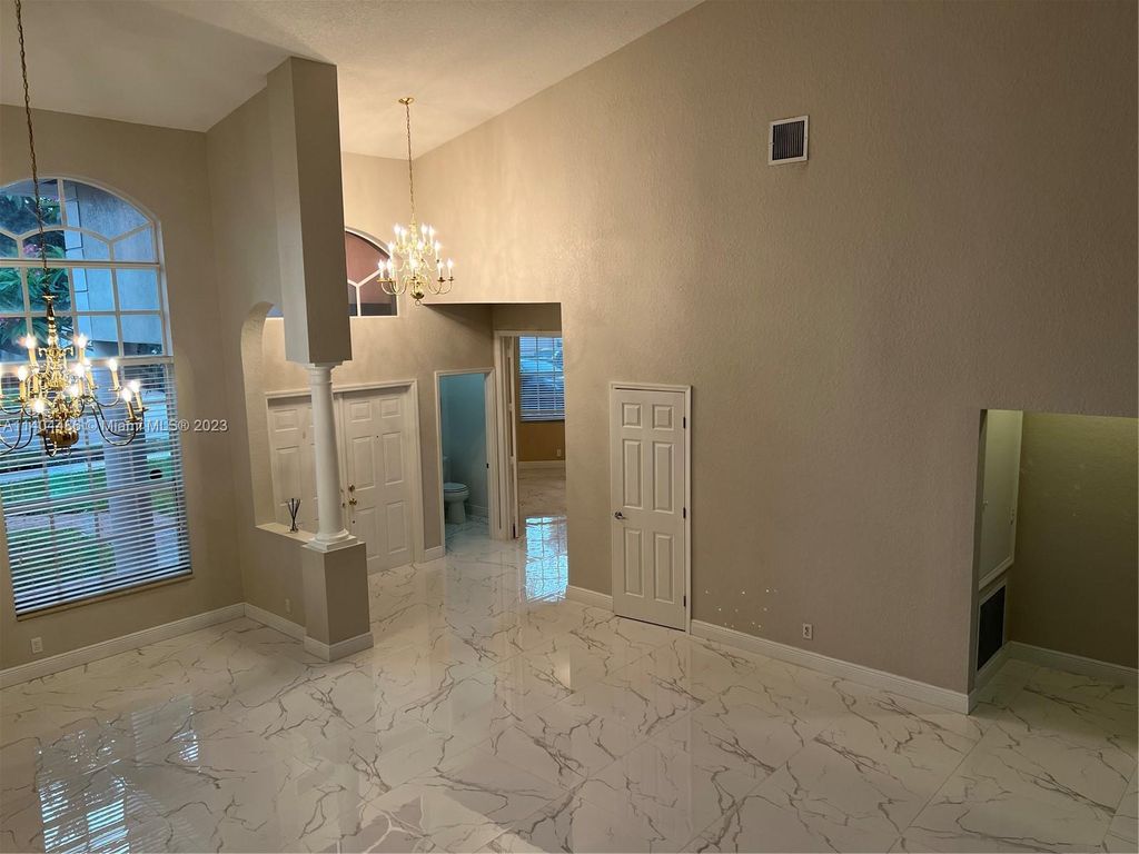 Photo of 13756 NW 21st St, Pembroke Pines, FL 33028 (MLS # A11404486)