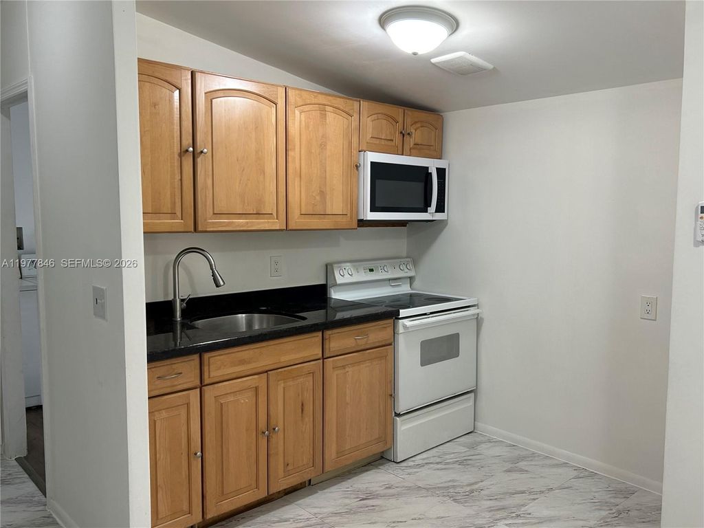 Photo of 10467 S 228th Ln #A, Boca Raton, FL 33428 (MLS # A11977846)