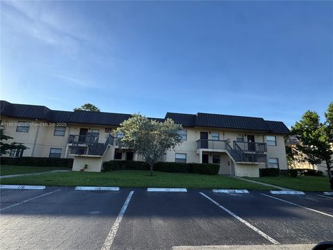 Photo of 142 NW 91st Ave #104, Pembroke Pines, FL 33024 (MLS # A11883926)