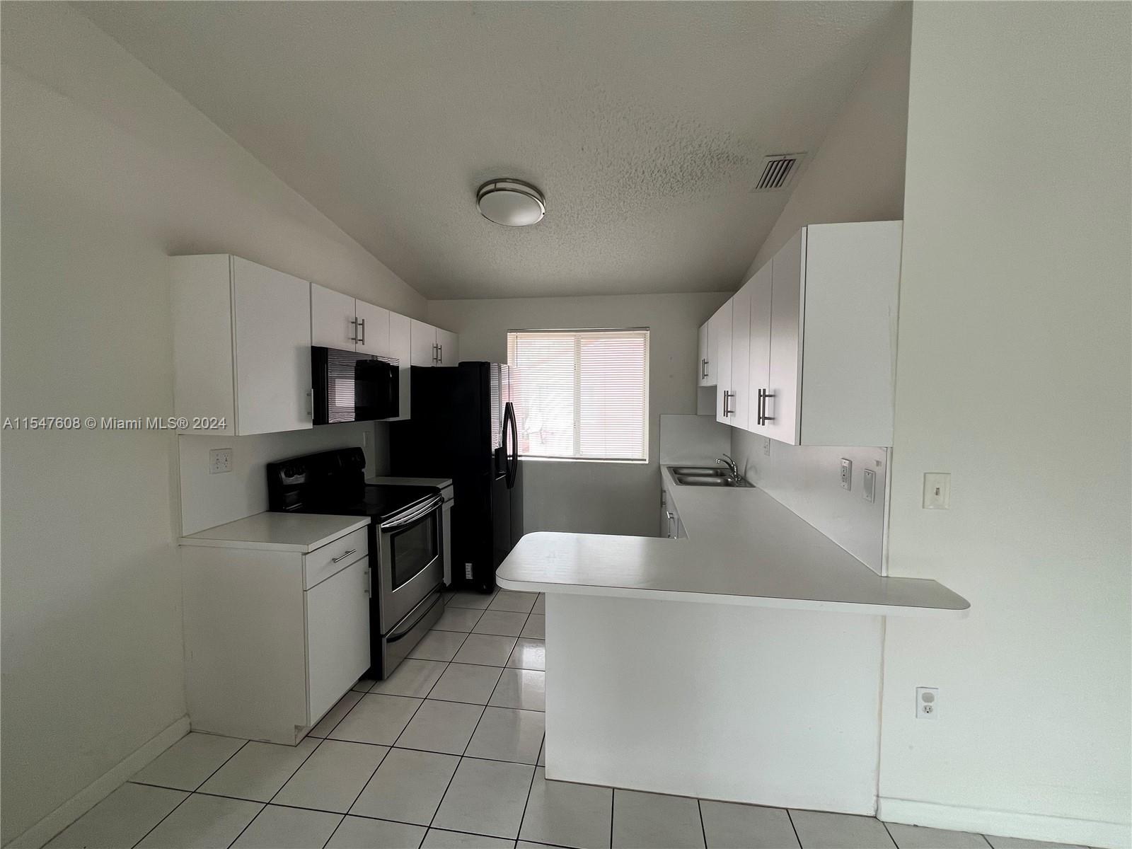 DORAL COURT CONDO - Residential Lease