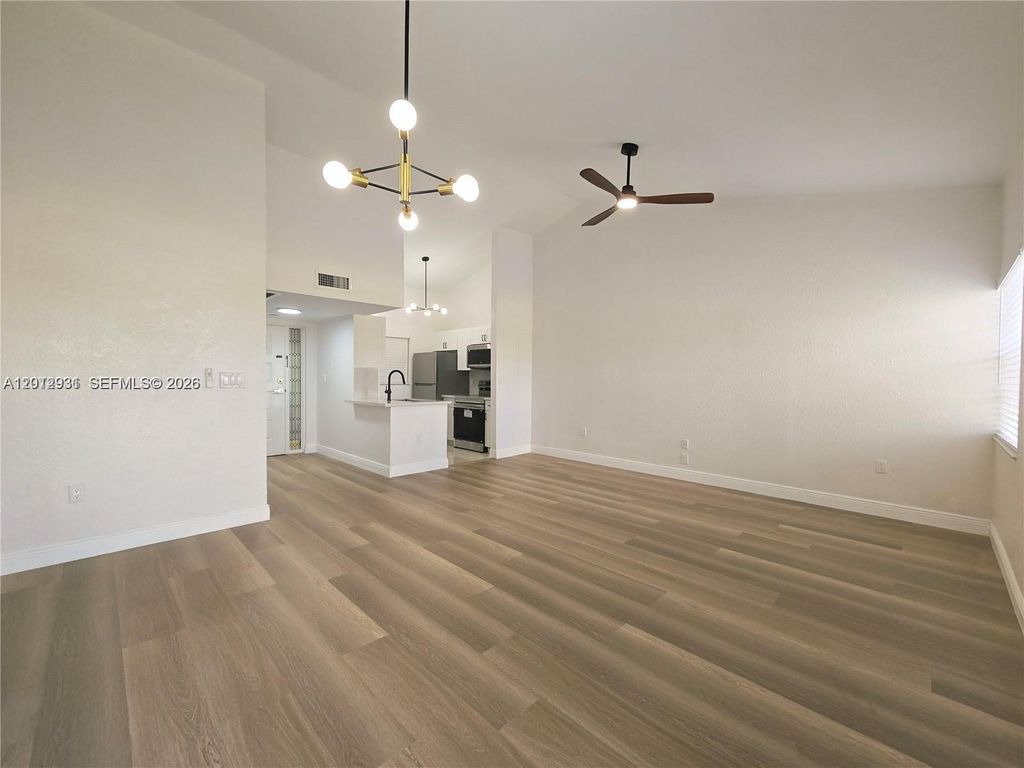 Photo of 2881 N Oakland Forest Dr #310, Oakland Park, FL 33309 (MLS # A12012931)