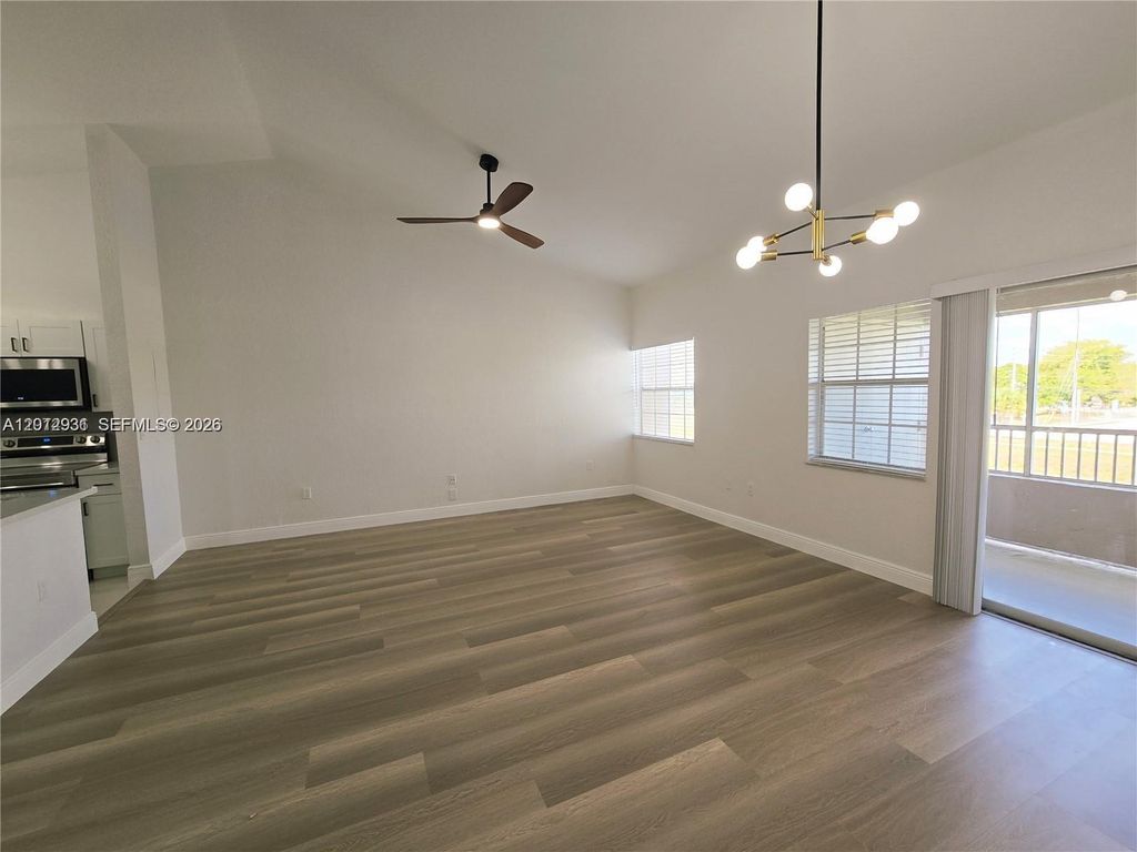 Photo of 2881 N Oakland Forest Dr #310, Oakland Park, FL 33309 (MLS # A12012931)