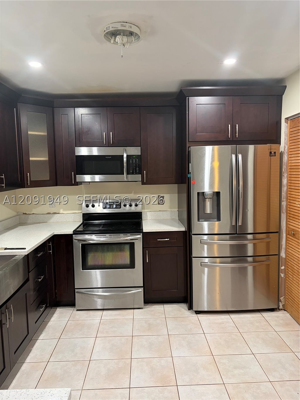 Photo of 10837 NW 8th St, Pembroke Pines, FL 33026 (MLS # A12091949)