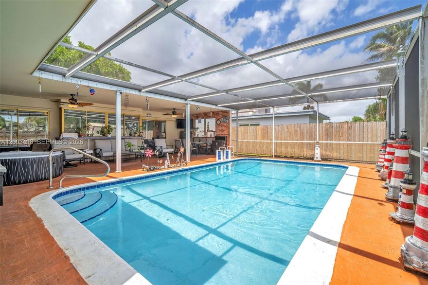 Want space? You got it, almost 2,800 SF of it. No HOA. X Flood Zone. Move-In Ready. Two Primary Suites. Multiple Living Experiences. Tucked into Hollywood Hills, this architecturally distinctive 4/3 pool residence was designed not just to be lived in, but to be experienced and loved. Every room has a name, a purpose, and a personality. This is not a floor plan. It's a lifestyle. Hurricane shutters throughout. Impact front door and the rare bay window is custom-made, double-panel vacuum-sealed hi-impact glass. S-tile roof (2016-17). Screened pool and patio, because South Florida and mosquitoes. Open floor plan. Flexible spaces. Private & completely fenced in. PVC plumbing. No cast iron pipes. Safe, family-oriented Hollywood Hills. Top-rated schools minutes away, including Chaminade-Madonna, Nativity and The Jewish Academy. Near Joe DiMaggio Children's Hospital and Memorial Regional, perfect for medical professionals. Electric vehicle charger? Install anytime, no HOA, no restrictions. Beach? Within just a few minutes of Hollywood Beach and Broadwalk, and a short distance to dining, shopping and entertainment, Dania Pointe, Fort Lauderdale-Hollywood International Airport, Port Everglades, Hard Rock Hotel and Casino, Aventura Mall, Tri-Rail and all major roads. Warning: Buyers who walk through stop comparing. They start figuring out how fast they can make it theirs. Multi-gen living, Airbnb, or simply yours. And yes. There is room for the dog. And the cat. And your sanity.