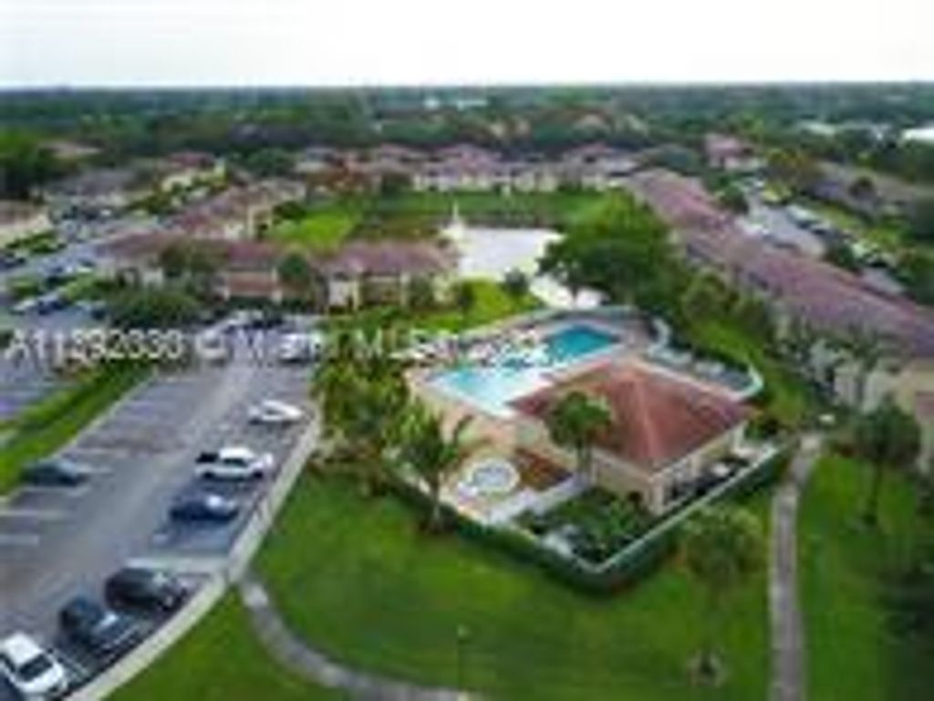 Photo of 9960 Twin Lakes Dr #34-H, Coral Springs, FL 33071 (MLS # A11392030)