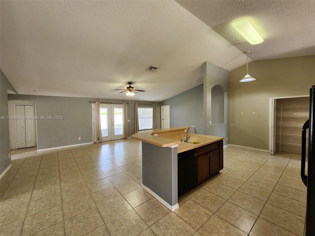 Photo of 316 SW Kestor Dr, Port Saint Lucie, FL 34953 (MLS # A11799902)