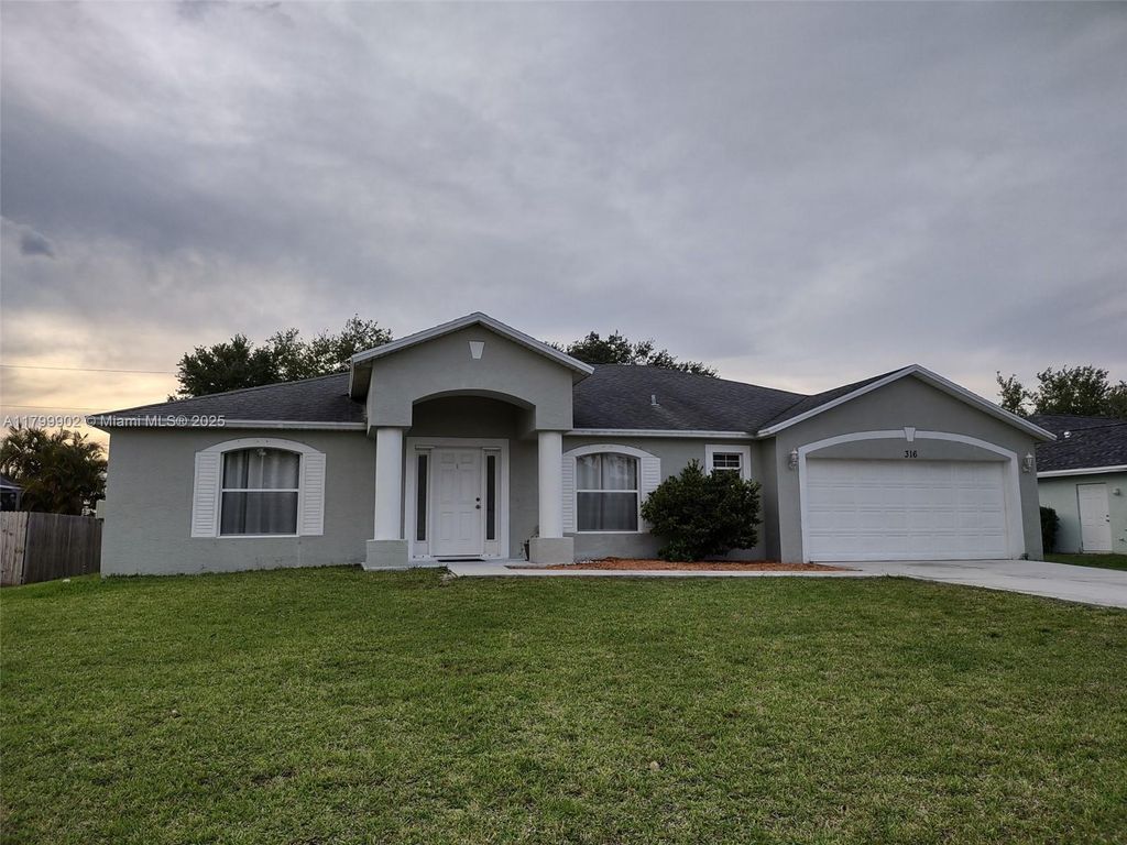 Photo of 316 SW Kestor Dr, Port Saint Lucie, FL 34953 (MLS # A11799902)