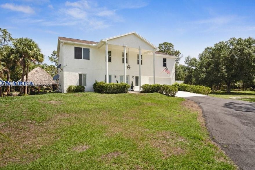 Recently remodeled for both comfort and entertainment, offering open living spaces, contemporary finishes, and a connection to nature that makes every day feel like a retreat.
Enjoy spacious bedrooms, spa-inspired bathrooms, and impact windows throughout for comfort and peace of mind. Natural light flows through the home, highlighting the modern finishes and warm.
Step outside to your very own backyard oasis. Relax in the luxurious new jacuzzi deck for 7, sip drinks at the tiki bar, or cast a line in your private lake with a stunning cascade waterfall at its center. Expansive patios provide endless space for entertaining or quiet evenings under the stars.
With 5 acres of land, the possibilities are endless — from gardens to equestrian facilities to future expansion.