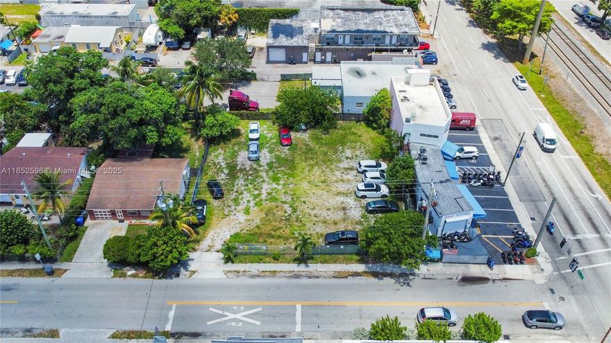 Unique Development Opportunity in Hollywood, FL!  Rare chance to own a 5,682 sq. ft. vacant lot zoned DH-3, allowing for single-family or multifamily development. One of the few remaining buildable lots in this rapidly growing area ideal for builders, investors, or developers seeking a prime location. Situated near major highways, shopping, dining, and just minutes from the beach, this property offers both convenience and high demand potential. Additional Opportunities Available: Adjacent lot is also for sale, so combine for a larger development footprint.  The property is part of an operating body shop that’s available for purchase, including real estate and an established business. Don’t miss this chance to invest in one of Hollywood’s most sought-after areas with strong growth potential
