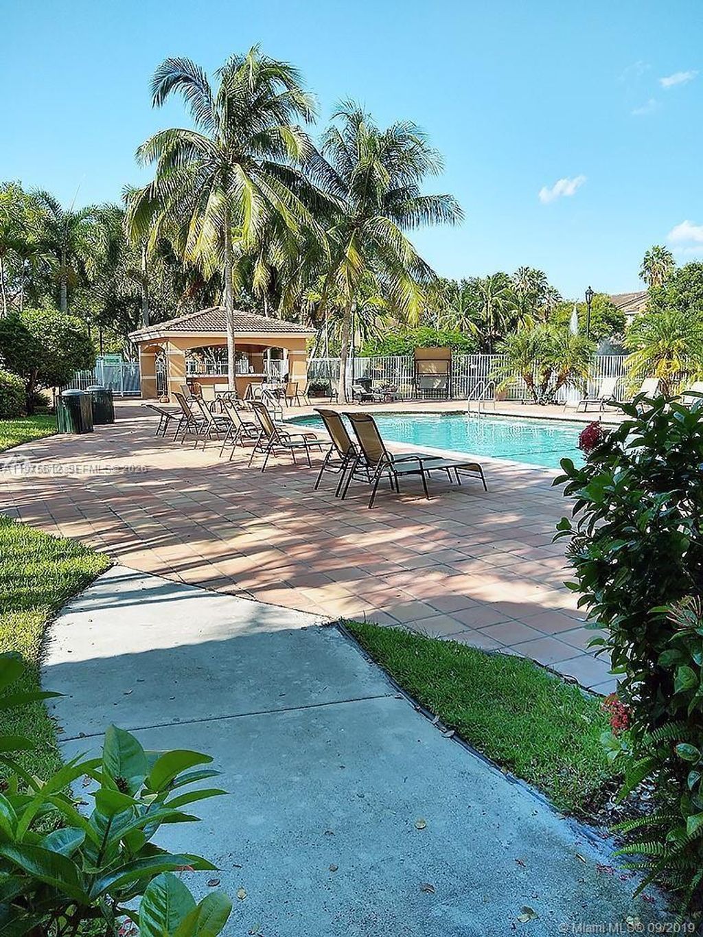 Photo of 3848 Lyons Rd #205-1, Coconut Creek, FL 33073 (MLS # A11975612)