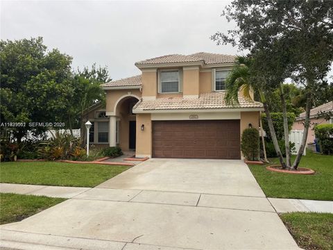 Photo of 1552 NW 135th Ave, Pembroke Pines, FL 33028 (MLS # A11939511)