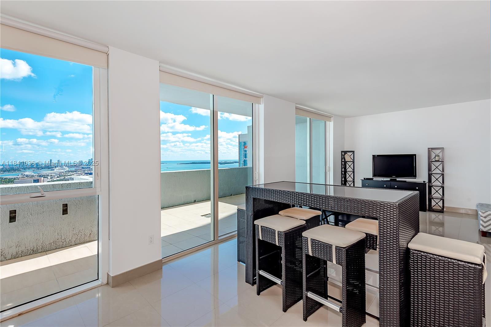 Experience luxury living in this beautifully furnished studio condo at Vizcayne Bay, located in Downtown Miami. Enjoy stunning views and high-end amenities just steps from Bayfront Park, Bayside, the American Airlines Arena, and top restaurants.
This stylish studio features laminate flooring, a washer and dryer, a modern kitchen, a marble bathroom, and high ceilings for an expansive feel. Perfect for both homeowners and investors alike.
The complex boasts 24/7 security, valet service, concierge assistance, a sauna, spa, gym, social area, and a movie theater. With four pools and a two-story gym, this property offers everything for a luxurious lifestyle. Don't miss this amazing opportunity!