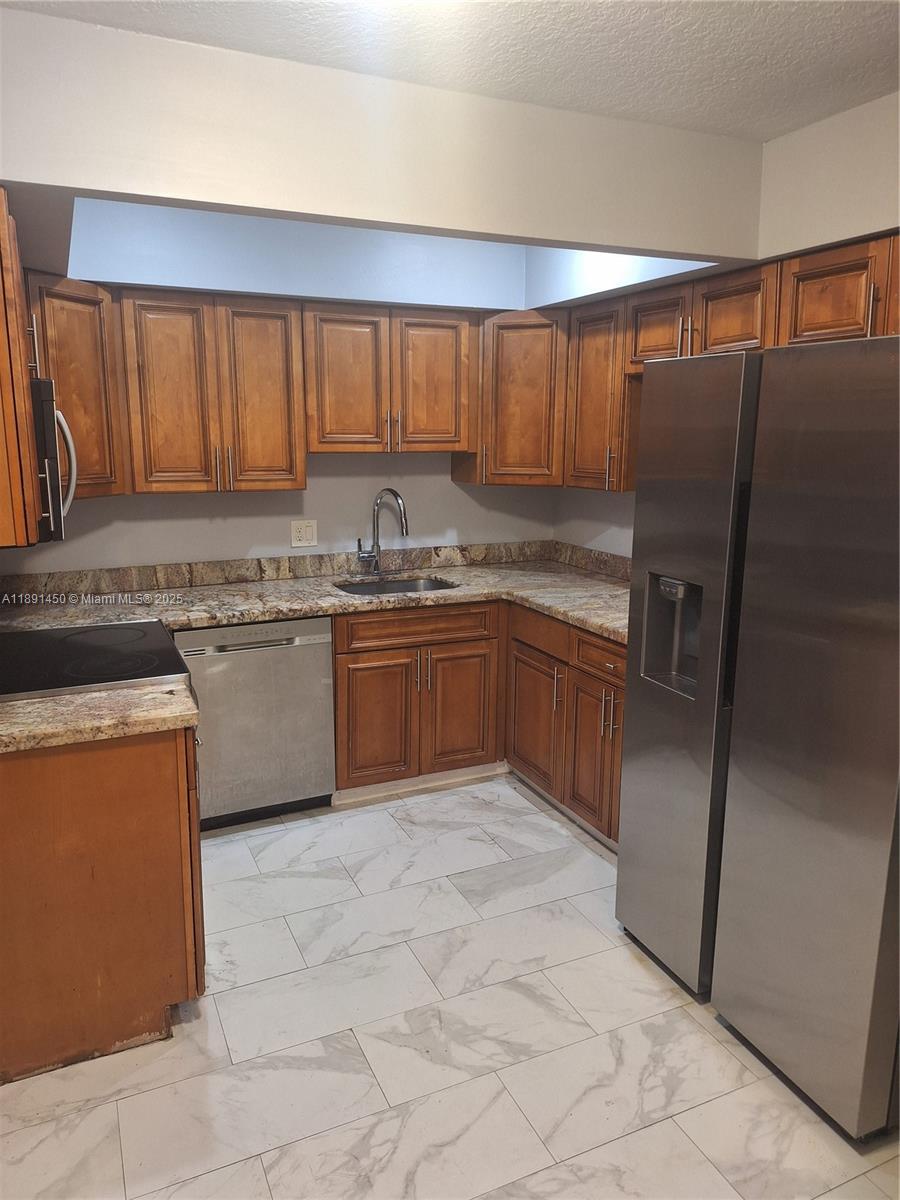 Duo-Level Townhome in West Palm Beach. Spacious layout with ample living space, dining, including a balcony for additional flexibility. Walking distance to shopping, dining, and entertainment options. Just 5 minutes to the beach. Washer and dryer included in the unit. Easy to access. Use Showing time. Contact Listing Agent.