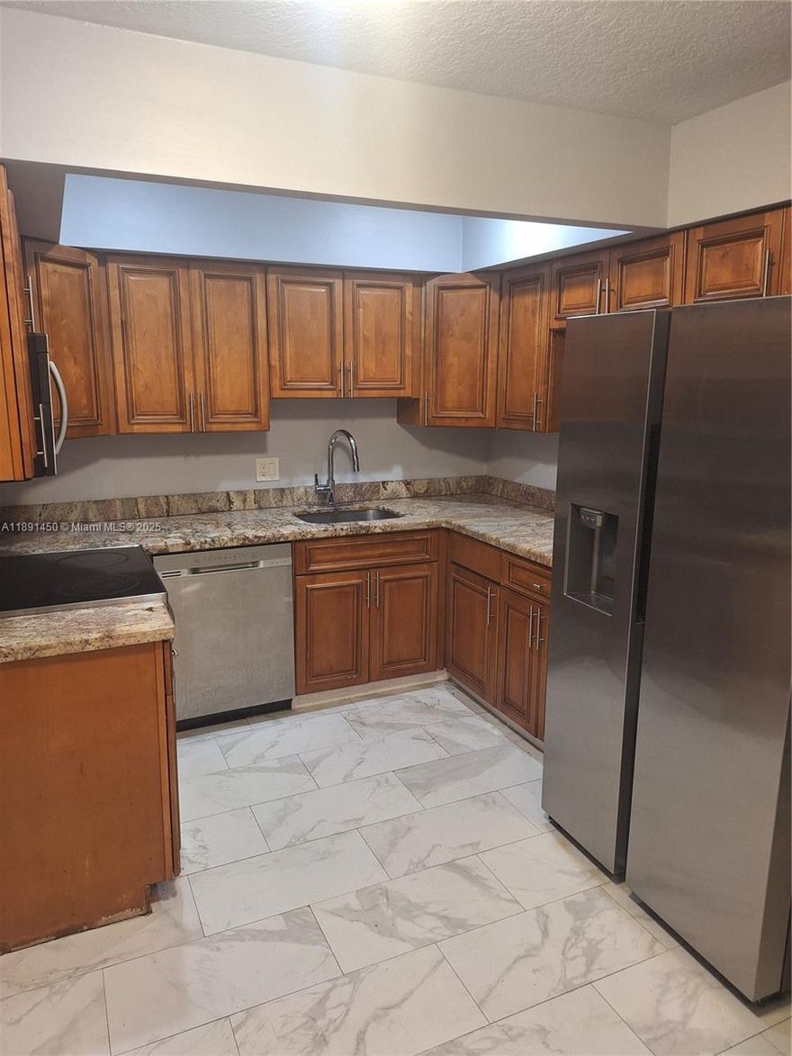 Duo-Level Townhome in West Palm Beach. Spacious layout with ample living space, dining, including a balcony for additional flexibility. Walking distance to shopping, dining, and entertainment options. Just 5 minutes to the beach. Washer and dryer included in the unit. Easy to access. Use Showing time. Contact Listing Agent.