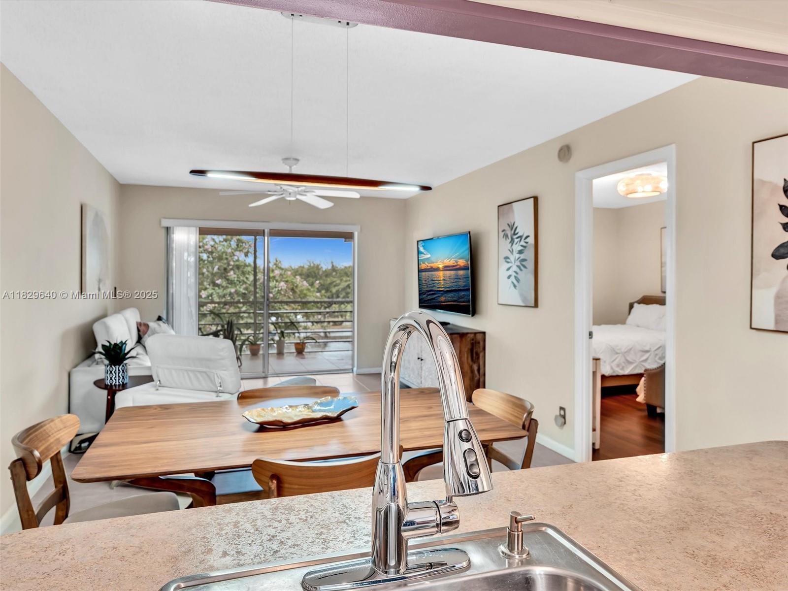 Immaculate 1BR/1BA fully furnished condo in sought-after Holiday Springs Village, an active 55+ community in Margate, FL. This top-floor unit offers privacy, tranquility, no upstairs neighbors, and serene views—ideal for year-round or seasonal living. Features include a bright, spacious layout, neutral tile, screened balcony, and a well-maintained interior. Kitchen with ample cabinets, large bedroom includes a generous walk-in closet and ensuite bathroom access. Enjoy resort-style amenities: heated pool, sauna, gym, tennis, pickle ball, shuffleboard, library, theater, and more. HOA includes water, cable, internet, insurance, and more. Laundry in building. Near shopping, dining, golf, and beaches. No pets, no rentals, 20% down if financing. Minimum 650 credit score.