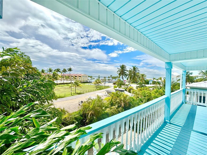 Welcome to 155 Airstream Lane, a serene coastal retreat on Plantation Key in Islamorada. This charming three-story home features bright living and dining areas, a full bathroom, and a spacious terrace to enjoy the tropical breezes. The kitchen features GE appliances, wood cabinets, and generous counter space. Upstairs, there are three bedrooms, two bathrooms, and a loft/home office with water views from the terrace. With a metal roof, impact windows and doors, and roll-down shutters, this home is built for comfort and protection. A large garage, workspace, screened porch, and garden add versatility. Located on a quiet dead-end street near Founders Park, with access to a boat ramp, pickleball courts, beach, and Aquatic Center—free for Islamorada residents!