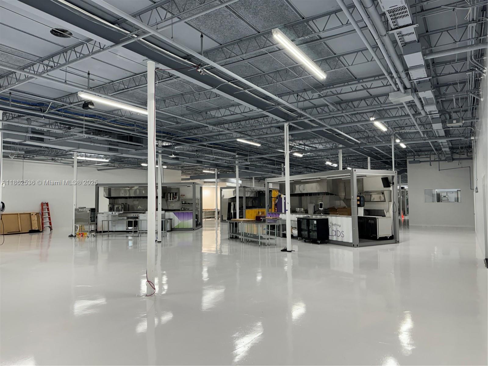 Renovated within the past year, this beautifully updated warehouse is move-in ready and equipped to meet the needs of modern industrial businesses, offering convenience and efficiency.
Conveniently located near Miami International Airport, the property provides exceptional access to major logistics hubs and transportation networks.
The property combines functionality with premium finishes and features 14-foot ceilings, full HVAC, and substantial power capacity to support high-demand operations.
Additional features include dock height loading bays, ample gated
parking, newly constructed ADA-compliant restrooms, and fully built-out spaces with conference rooms.