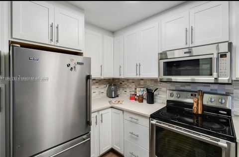 Photo of 7173 Orange Dr #214B, Davie, FL 33314 (MLS # A11861787)