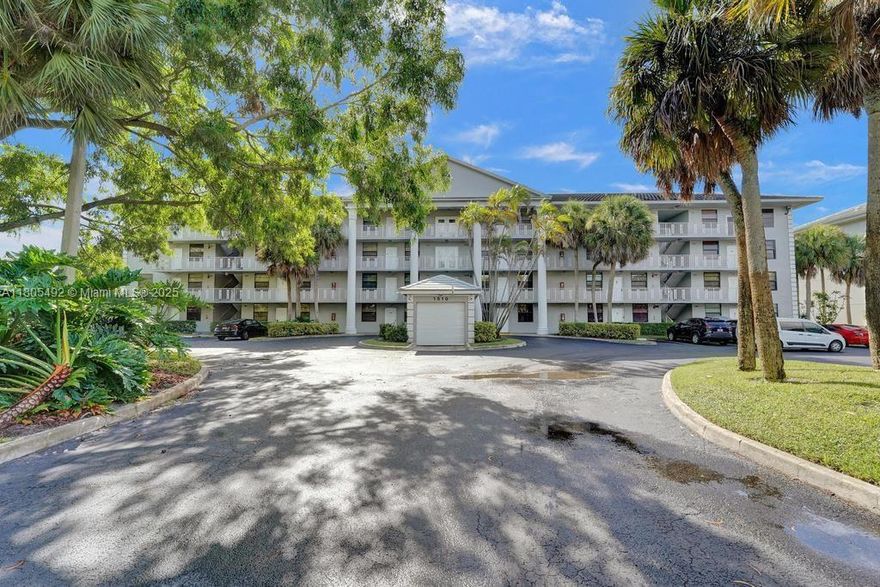 This 2 bedroom 2 bathroom 4th floor Whitehall Condo overlooking golf course is located in the private country club community of Pine Island Ridge, an all age community!  1,385 square feet of luxury living space with full size washer & dryer in unit and extra room which can be a 3rd bedroom/office/den/storage!  Walking distance to community pool, shopping, banks and restaurants!  Top school district!  Country Club features 2 restaurants, gym, golf, tennis and much more!  Assoc states no renting for first 2 years, no commercial vehicles or pickup trucks!  1 reserved parking spot and plenty of guest parking!  Put your personal touches like paint/flooring and turn this unit into a spectacular unit!