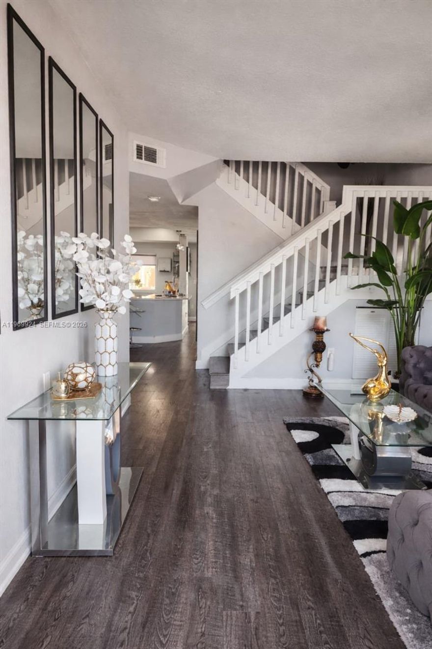 No Association. Turn key townhome a perfect blend of style and functionality, completlty remodeled, kitchen offers stone countertops, new appliances, incredibly spacious cabinets, also enjoy the confort of formal living room as well as formal dining room and florida room. Four bedrooms, two full bathroms and one-half bathroom. Master suite has an ensuite remodeled bathroom; three bedrooms are comfortably sized with ample closet space. One car garage, and a backyard. Important features include new roof and impact windows.