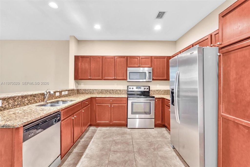 Photo of 3236 NW 31st Ter, Oakland Park, FL 33309 (MLS # A11970529)