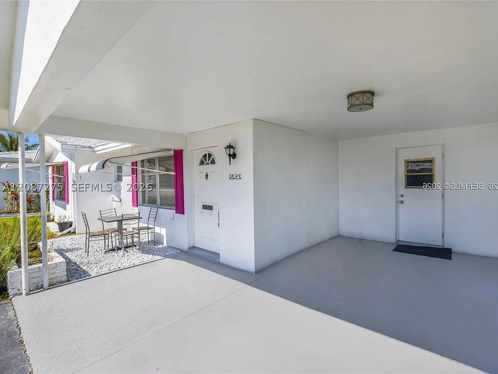 Photo of 2550 NW 2nd Dr, Pompano Beach, FL 33064 (MLS # A12087275)