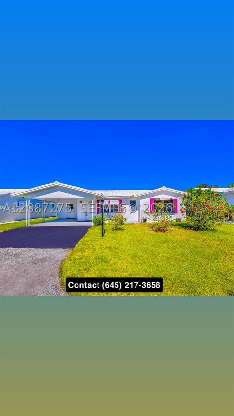 Photo of 2550 NW 2nd Dr, Pompano Beach, FL 33064 (MLS # A12087275)