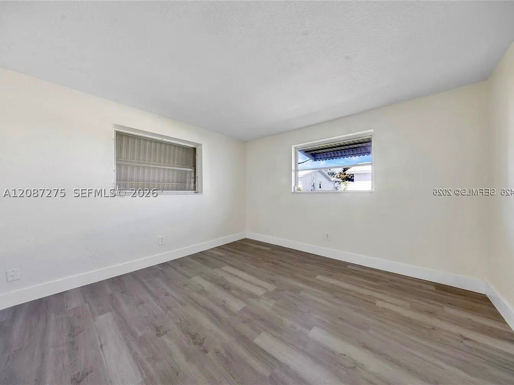 Photo of 2550 NW 2nd Dr, Pompano Beach, FL 33064 (MLS # A12087275)
