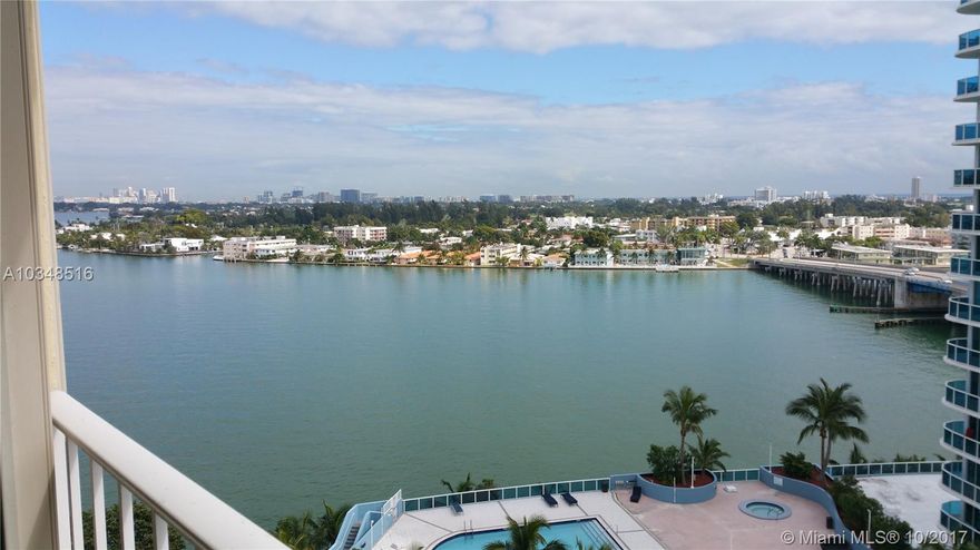 Remodeled condo with bay & city views! New AC unit, ceramic floors, crown moulding, granite kitchen counters, stainless steel appliances, wooden cabinets & modern light fixtures. Popcorn ceiling removed, hurricane shutters, full balcony, 2 walk-in closets, 2 large hallway closets. HOA fees $449/mo include hot water, basic cable & internet. Assigned parking space, guest parking, secure building, gym, party room, bay front pool & deck.