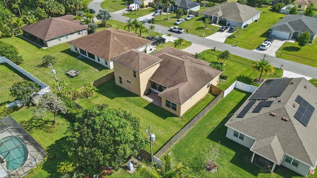 Photo of 1425 SW Oriole Ln, Port St Lucie, FL 34953 (MLS # A11871326)