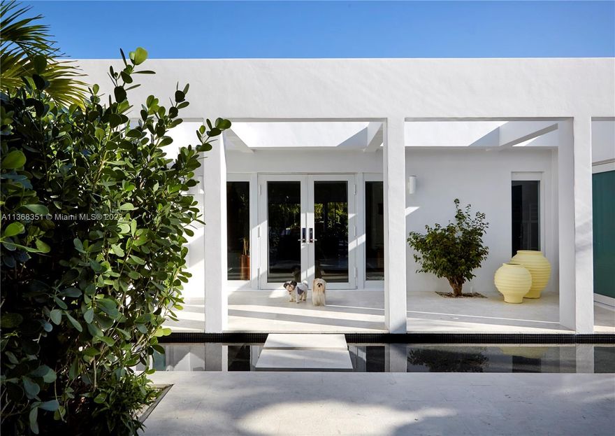 Hidden gem in one of Key Biscayne's most desired streets. Extensively renovated in 2019 by celebrated designer James Duncan with no detail spared. 5 bedrooms and 6 full bathrooms. A wide open layout with a vaulted French kitchen overlooking a lush courtyard perfect for entertaining. Extremely private, with palm trees surrounding the entire property. Updated appliances and impact windows. Beautiful heated pool that acts as a mirror reflecting the house. Move-in ready!