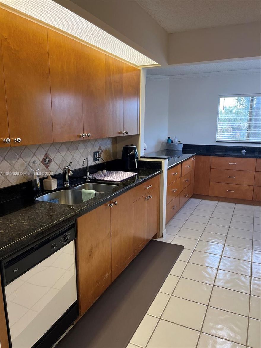 LARGE, BEAUTIFUL, 3RD FLOOR CORNER UNTI IN 24 HOUR GATED, 55+ ADULT, VIBRANT, PRESTGIOUS GOLF CLUB COMMUNITY. PRIVATE, QUIET AND PEACEFUL BLDG WITH GREEN AREA ON NORTH END & POOL ON OTHER OF BLDG WITH PLENTY GUEST PARKING. NEWER SECTION OF CENTURY VILLAGE. MAGNOLIA MODEL FEATURES EXTENSIVE CUSTOM KITCHEN CABINTRY, GRANITE COUNTER TOPS, TILE FLOORING THROUGH OUT, CROWN MOLDING,SPACIOUS BED ROOMS BOTH WITH WALK-IN CLOSETS, WASHER & DRYER INSIDE UNIT, TANKLESS WATER HEATER, NEW BLINDS, NEW FANS, NEW LIGHT FIXTURES, FRESHLY PAINTED & PLENTY OF NATURAL LIGHT. EXTENDED SCREENED BALCONY FEATURES ADDTIONAL HURRICANE RESISTANT SLIDING GLASS DOORS FOR BEST USE ALL YEAR ROUND. RESORT STYLE AMENTIES INCLUDE 71 PAR GOLF COURSE, 1042 SEAT THEATER, HEALTH &FITNESS CENTER, GRAND BALLROOM, IN & OUTDOOR HEATED POOLS, PICKELBALL COURTS /TENNIS COURTS /BASKET BALL COURT /BILLARDS ROOM /PHARMACY/CAFE/LIBARY/SHUTTER BUS & SO MUCH MORE. LOCATED NEAR SHOPPING, RESTAUARNTS, MALLS, PARKS, HOSPITAL, HIGHWAYS