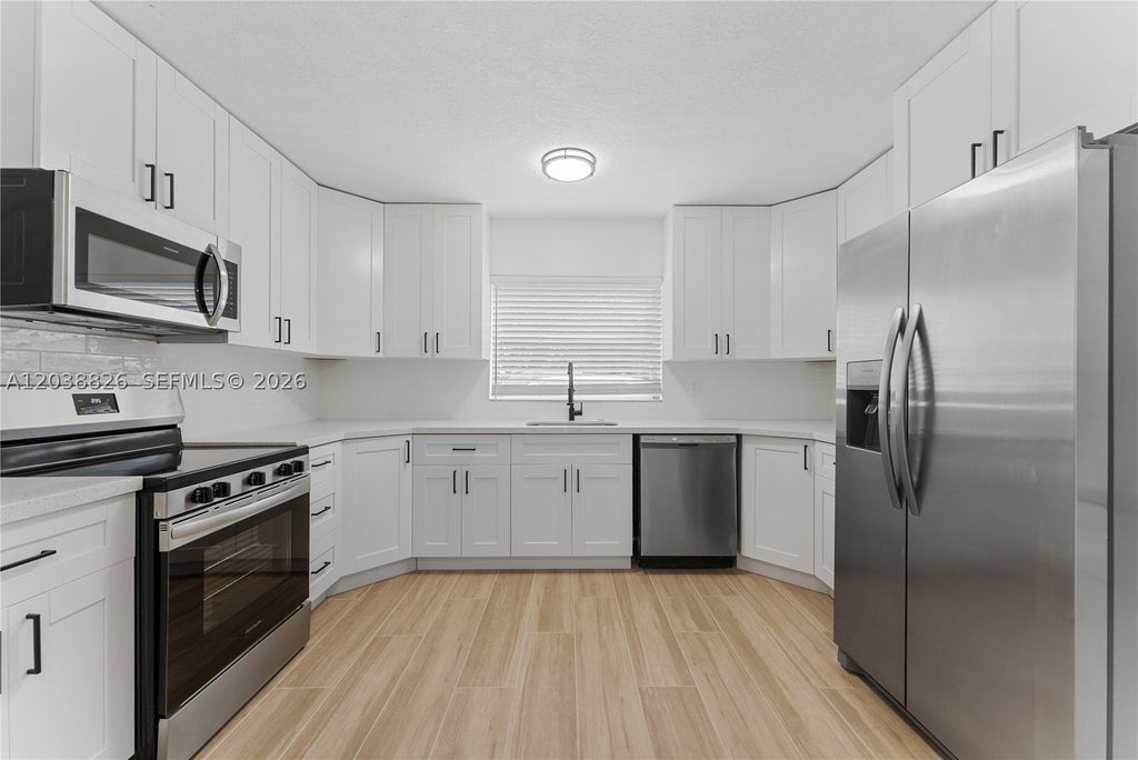 Photo of 10261 NW 35th St #10, Coral Springs, FL 33065 (MLS # A12038826)