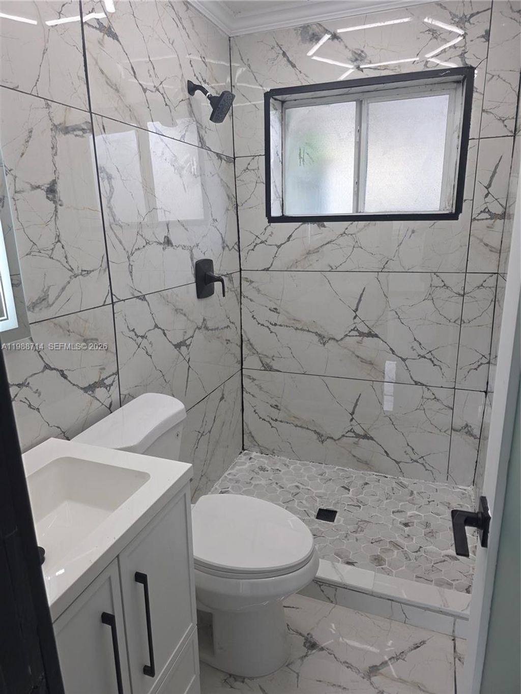 Photo of 636 NW 14th Ter #1, Fort Lauderdale, FL 33311 (MLS # A11988714)