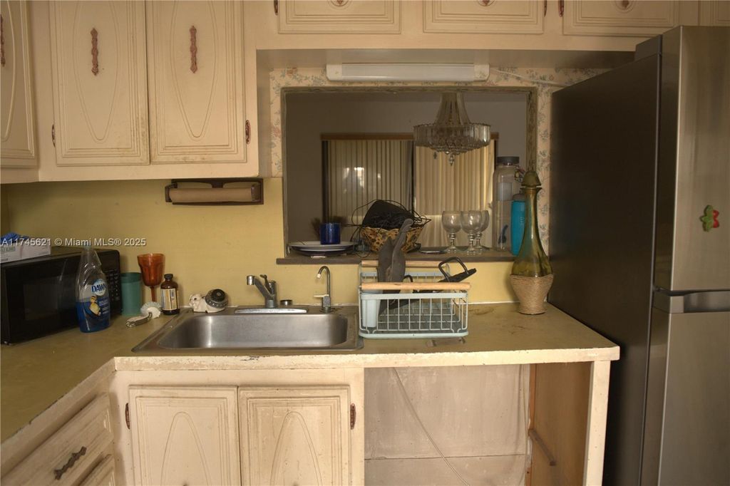 Photo of 4270 NW 40th St #103, Lauderdale Lakes, FL 33319 (MLS # A11745621)