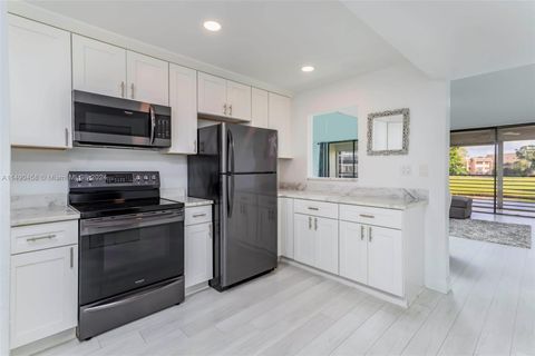 Photo of 10180 NW 30th Ct #210, Sunrise, FL 33322 (MLS # A11490458)